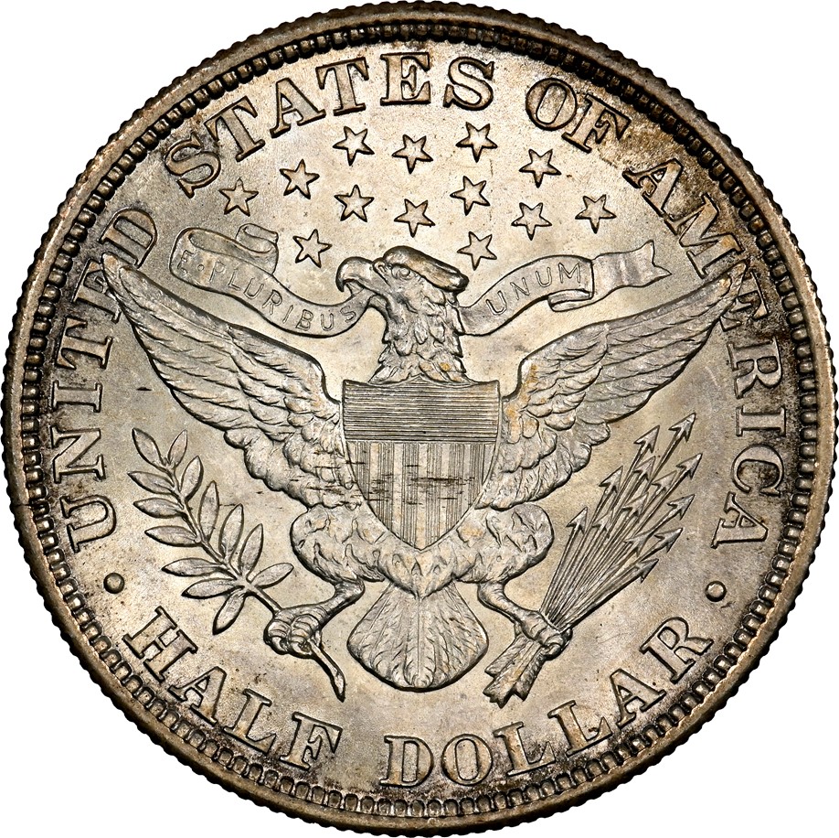 Close-up of 1899-S Barber Half Dollar reverse inscription showing 'UNITED STATES' and 'DOLLAR' lettering under magnification